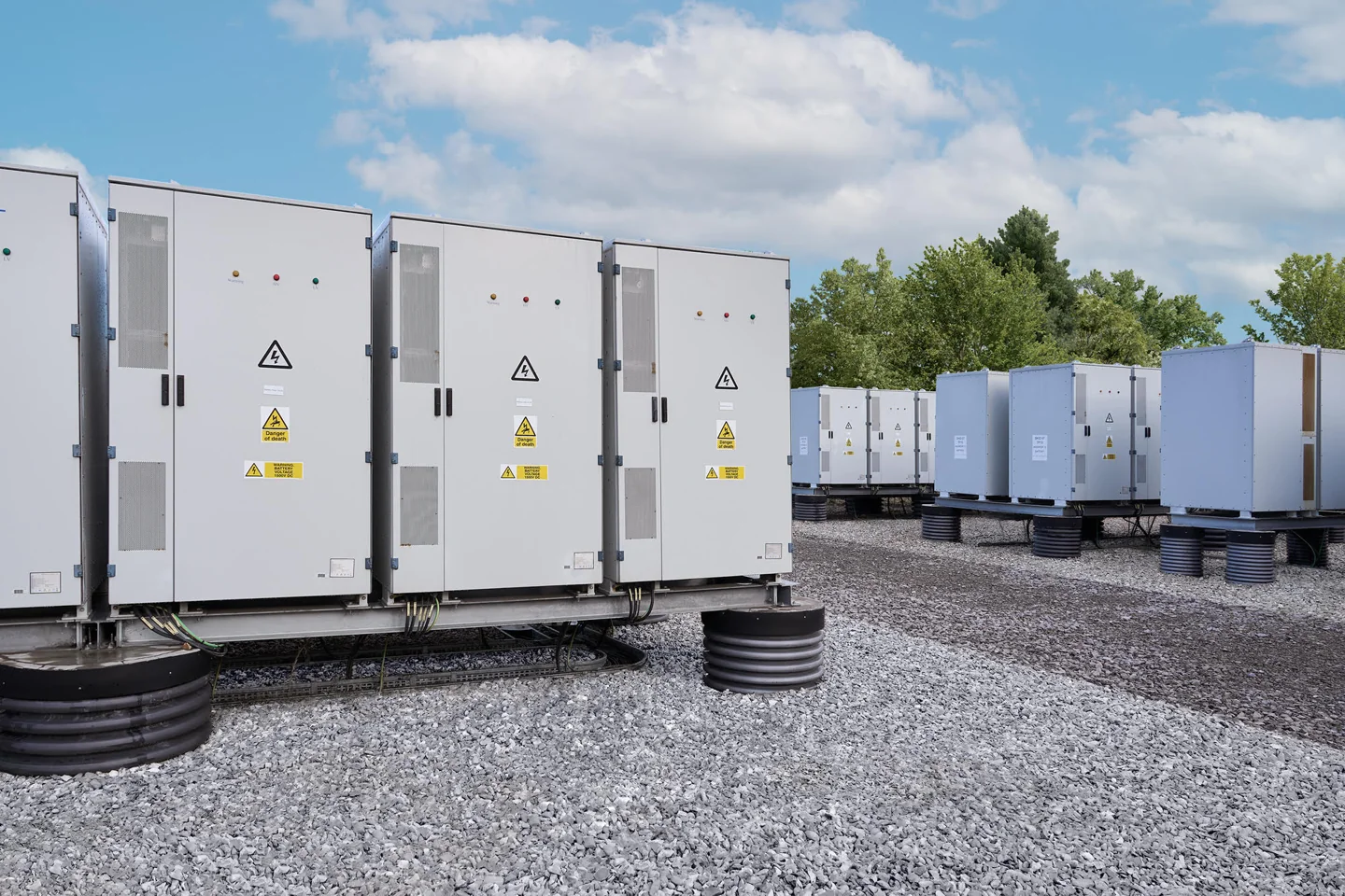 Outdoor battery storage cabinets connected to electricity infrastructure